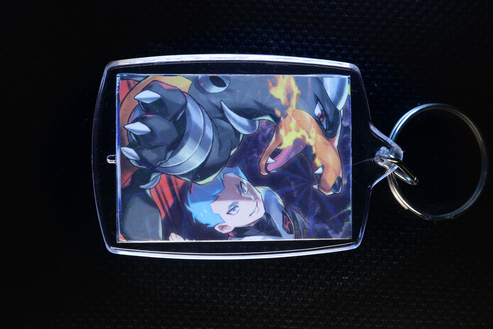 Team Rocket's Houndoom Holographic Card Keychain — $12.95